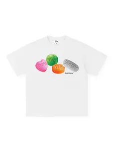 Heavyweight white cotton unisex t-shirt featuring a vibrant YOU NEED ME BABY candy graphic