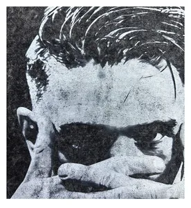 Macro detail of the vintage washed portrait print on a heavy cotton graphic t-shirt