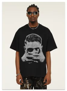 Close-up of vintage heavy cotton black t-shirt featuring a large artistic face graphic