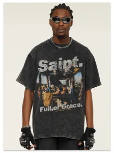Close-up of heavyweight acid washed streetwear T-shirt with vintage mural print and "Saint" text.