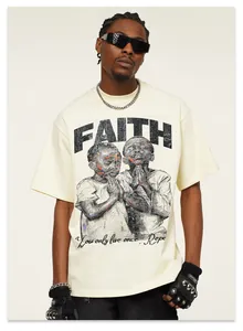 Close-up of American retro oversized cotton t-shirt with detailed faith graphic print.