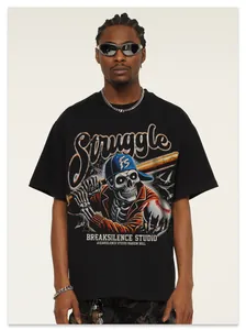 Detail of American high street oversized black T-shirt with baseball skeleton graphic.