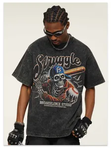 Close-up of vintage washed black oversized t-shirt with skeleton baseball graphic print