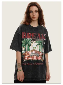 Close-up of vintage washed grey cotton t-shirt with leopard and palm tree graphic