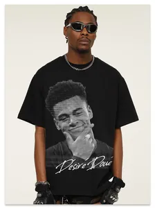 Detailed view of black high street t-shirt with Desiré Doué artistic portrait print.