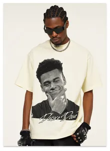 Detailed view of Men's beige oversized high-street T-shirt with a Desiré Doué graphic print