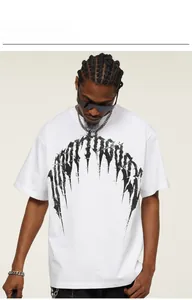 Close-up of model wearing white heavyweight cotton t-shirt with thorn graphic print
