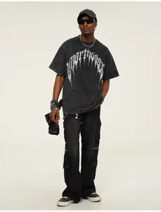 Detail showing the thorn style print on a heavy washed black cotton street t-shirt