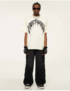 Full-body view of a male model wearing an off-white heavy cotton street style t-shirt