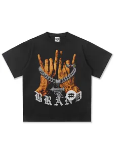 Streetwear heavy cotton T-shirt with vintage graphic print and gun pendant design