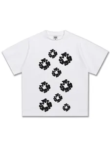 Men's white cotton T-shirt featuring black abstract popcorn prints in a streetwear style