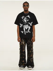 Full body studio shot of model wearing black heavy cotton pigeon graphic print t-shirt