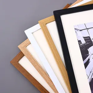 Set of minimalist picture frames in various wood colors for wall mount and tabletop display