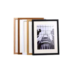 Minimalist wooden picture frame set in various colors including black, white and oak