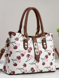 Elegant white women's handbag featuring a trendy cherry pattern and large capacity