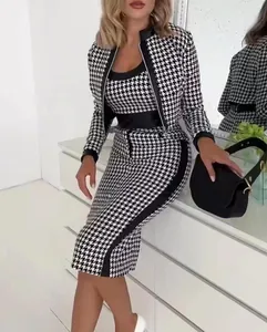 Elegant women's 3-piece houndstooth suit set with jacket, tank top, and skirt