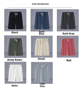 Choix de couleurs pour shorts amples en coton pour hommes avec cordon de serrage et taille.