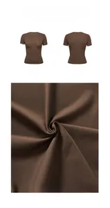 Detailed view of brown crew neck athletic t-shirt with buttery-soft fabric texture