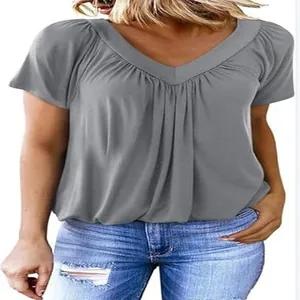 Close-up detail of a grey casual V-neck pleated T-shirt featuring stylish raglan short sleeves