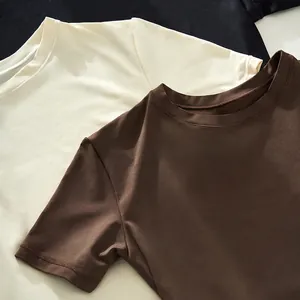 High-quality solid color high-stretch fitness T-shirt available in black, cream, and brown