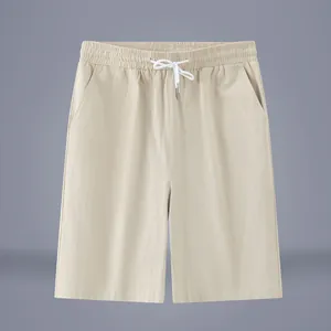 Short d'été ample en coton pour homme en coloris beige avec taille élastique à cordon