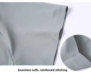 Close-up detail of seamless short sleeve cuff with bartack reinforcement on grey polo shirt