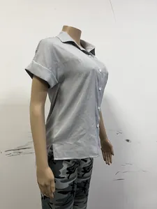Side view of women's gray short sleeve linen shirt with casual loose fit on mannequin
