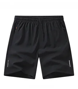 Pantaloncini sportivi neri da uomo con strisce riflettenti e tasche con cerniera