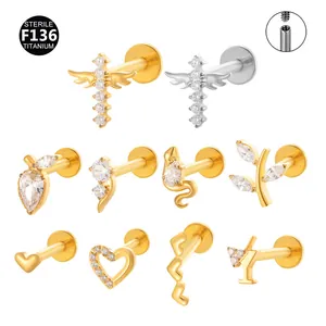 Collection of F136 titanium internally threaded labret studs with various charm designs