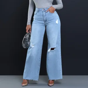 Detailed view of high-waisted distressed light blue wide-leg denim jeans for women