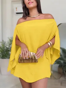 Close-up detail of the vibrant yellow off-the-shoulder dress with stylish split sleeves