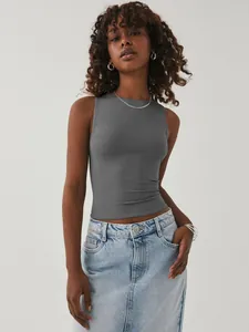 Detailed shot of a women's slim-fit dark grey sleeveless sports vest with crew neck