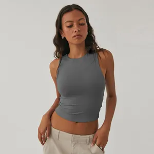 Detailed view of women's snug grey sleeveless crop top for sports and yoga fitness