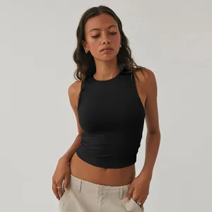 Close-up detail of black ribbed sleeveless crop top for women's fitness and yoga training