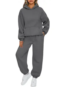 Detailed view of a dark grey hooded sweatshirt and joggers set for casual women's wear