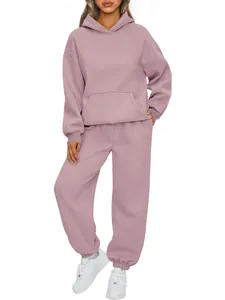 Women's mauve two-piece tracksuit set featuring a loose hoodie and joggers