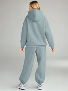 Detailed back view of a light blue oversized two-piece hoodie and jogger loungewear set