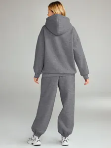 Back view of a gray two-piece tracksuit set featuring a hooded sweatshirt and joggers