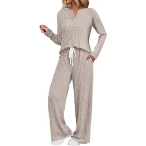 Detail view of women's ribbed knit loungewear set featuring a V-neck top and wide-leg pants