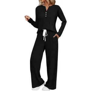 Full view of black ribbed knit loungewear set for women with long sleeves and pants