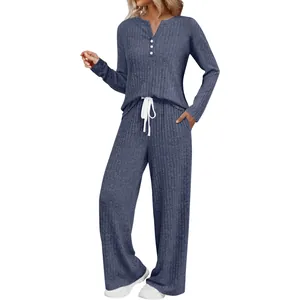 Detail of ribbed knit lounge set with V-neck button top and wide-leg drawstring pants