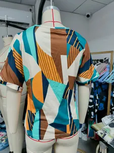 Detailed back view of women's summer short sleeve t-shirt with geometric abstract print