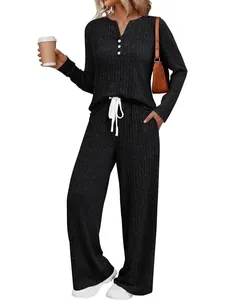 Women's two-piece ribbed knit lounge set featuring a long-sleeve button top and wide-leg pants