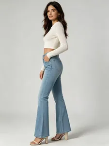 Side profile of high-waisted micro-flare blue jeans on model