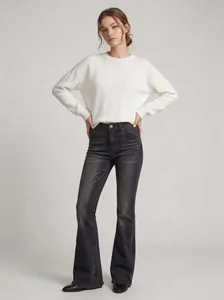 Full-length view of stylish high-waisted flared jeans for women in charcoal grey