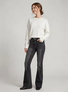 Full length view of women's high-waisted flared jeans in a vintage dark grey wash