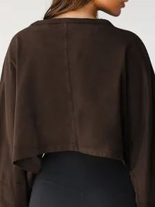 Detailed back view of a dark brown cropped sweatshirt showing seam construction