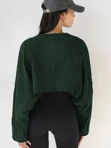 Rear view of a dark green long-sleeved cropped sweatshirt for women's athletic wear