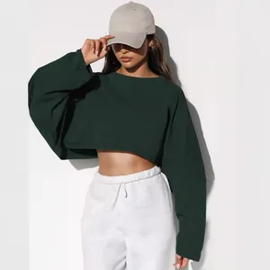 Women's trendy dark green cropped sweatshirt with oversized long sleeves and round neck