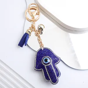 Porte-clés Main de Fatma en Strass Œil Maléfique Charme de Sac Paume en Cristal Bleu Avec Gland Anneau en Métal Doré